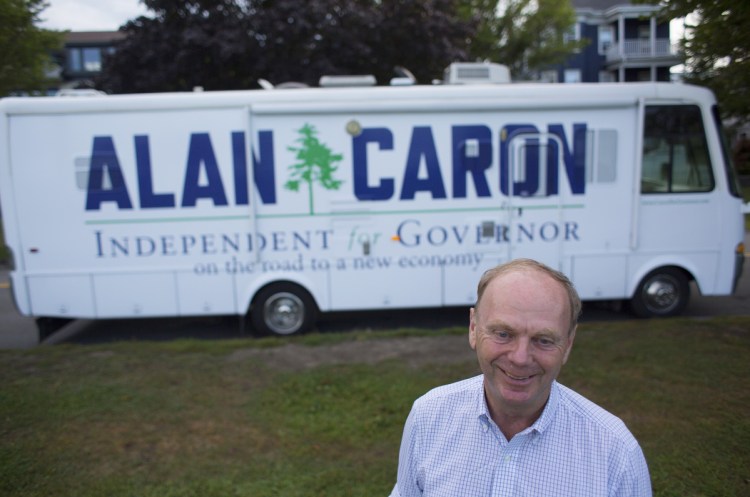 Independent Alan Caron stands Thursday in front of his new campaign vehicle, a 32-foot RV, at the Eastern Promenade in Portland, the final stop on a trip begun in Fort Kent.