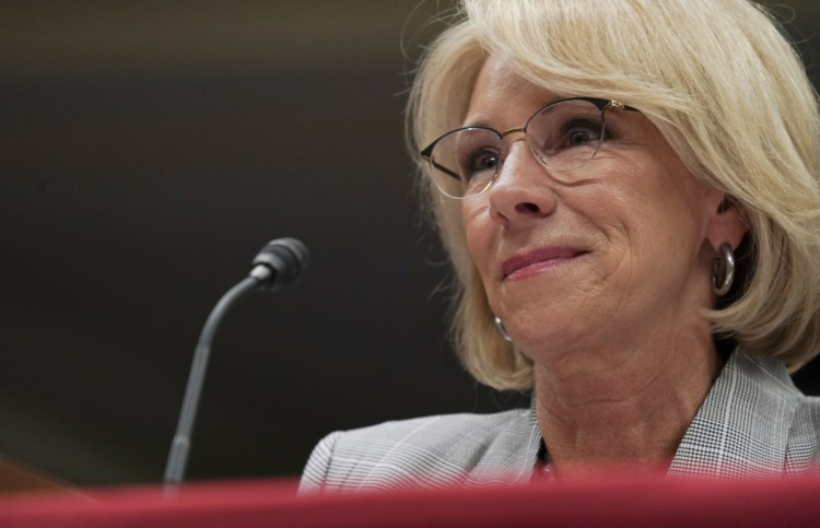 Education Secretary Betsy DeVos appears to be favoring for-profit colleges over their former students who were defrauded. 