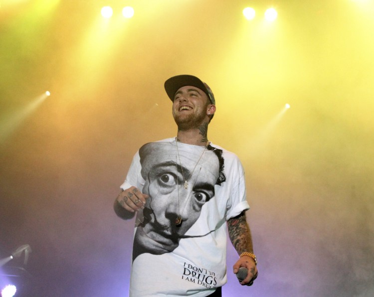 Rapper Mac Miller performs during his Space Migration Tour at Festival Pier in Philadelphia in July 2013. 