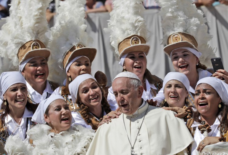 Pope Francis sings with a group of Mexican pilgrims at the end of his weekly general audience in St. Peter's Square at the Vatican on Wednesday. On Saturday he told newly ordained bishops to reject abuse but did not address the most recent allegations against the Catholic Church.