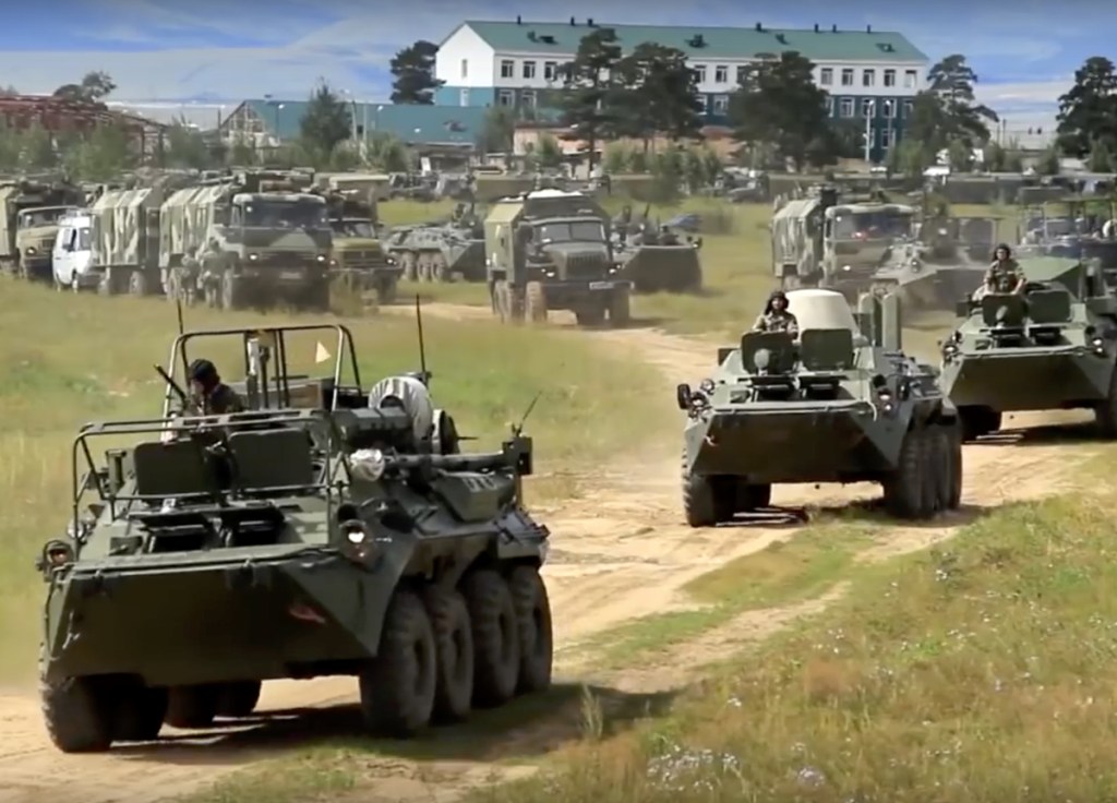 Armored personnel carriers roll out during the Vostok 2018 military exercises in Russia on Tuesday. Nearly 300,000 Russian troops and 36,000 tanks are expected to participate.