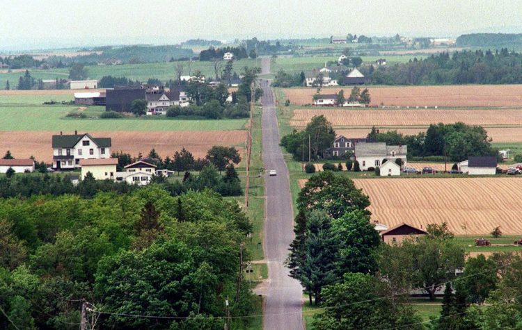 Potato farms, a big part of the Aroostook County economy, butt against Centerline Road in Presque Isle. The county had the lowest median income in Maine in 2017, at $43,015 a year.