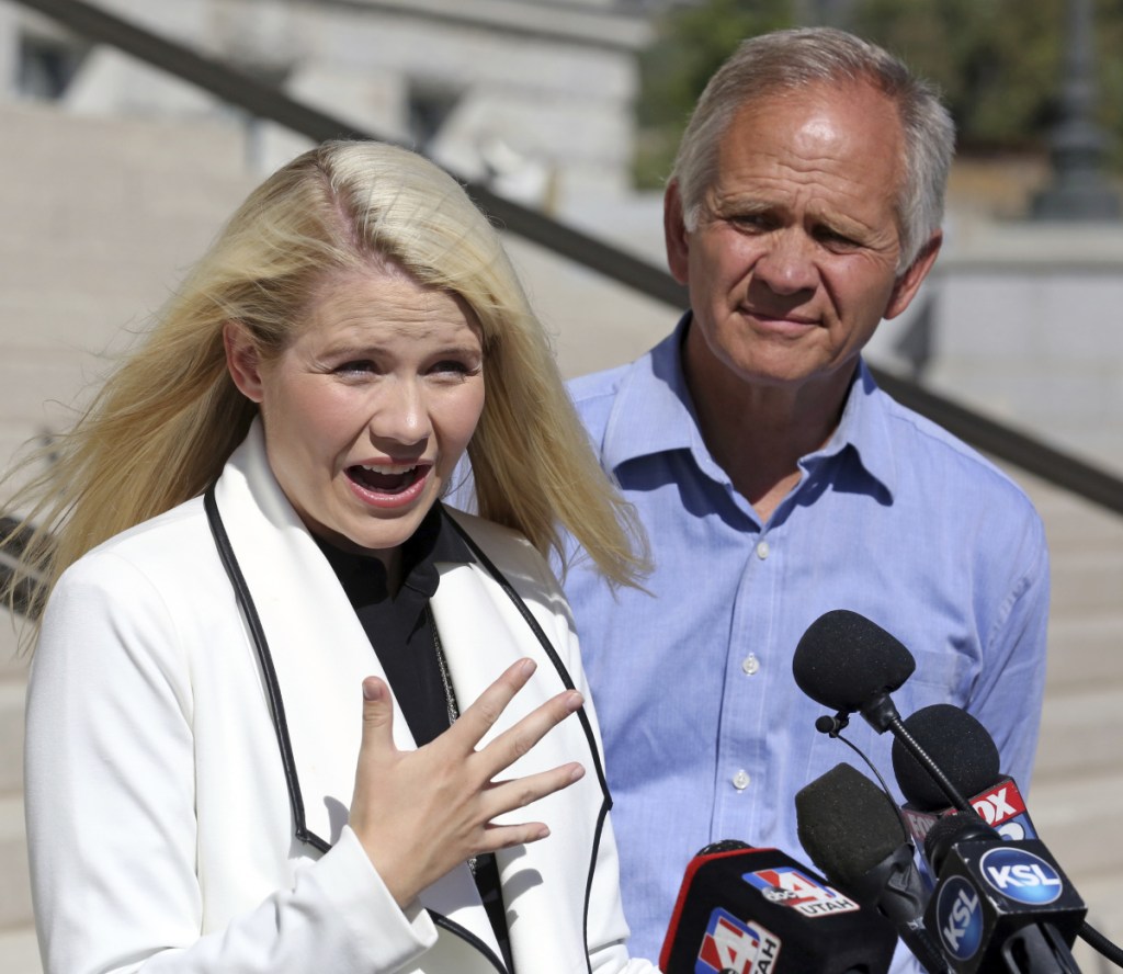 Elizabeth Smart speaks during a news conference with her father, Ed Smart, on Thursday in Salt Lake City. Smart said that she only found out about Wanda Barzee, above, being released next week shortly before the public did.
Associated Press/Rick Bowmer/Utah State Prison
