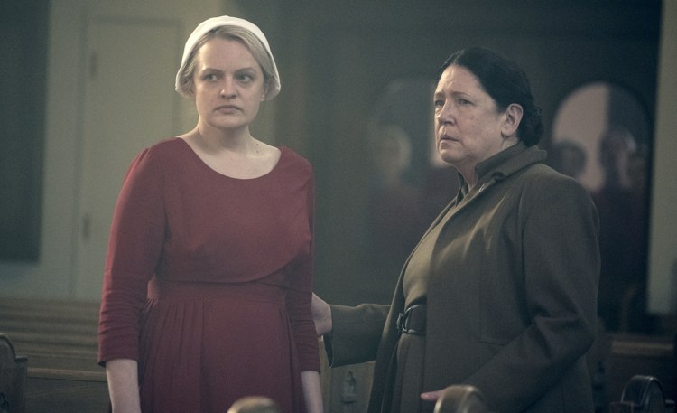 Elisabeth Moss, left, and Ann Dowd in "The Handmaid's Tale." The Hulu series is favored to win the best drama award in Monday's Emmy Awards.