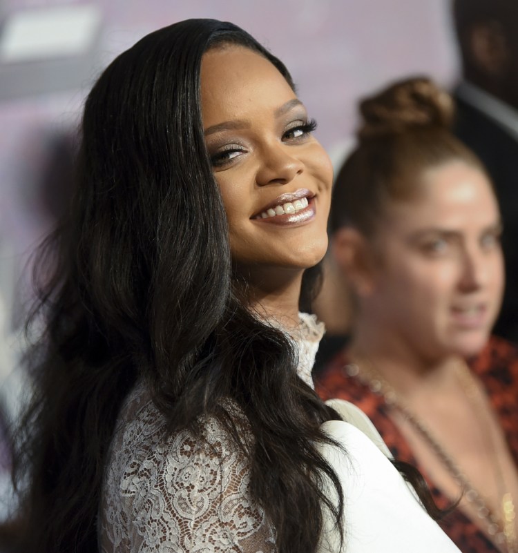 Rihanna is in high spirits Thursday night at the fourth annual Diamond Ball in New York.