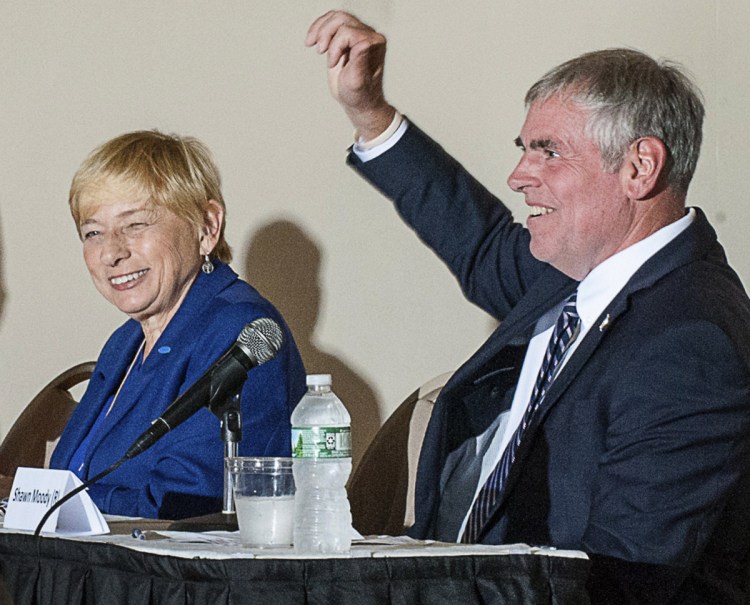 Janet Mills and Shawn Moody attend a forum with other gubernatorial candidates in Lewiston on Sept. 10.