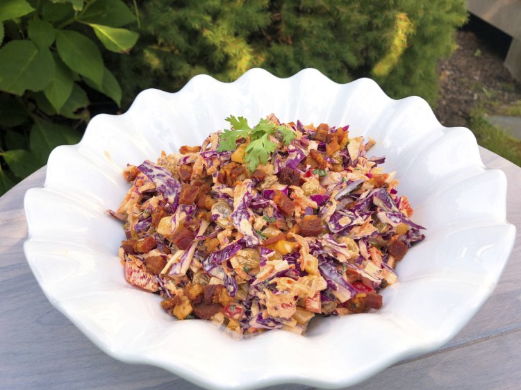 Confetti Coleslaw is packed with veggies and goes perfectly with hearty meat dishes like ribs or chilis that use spices like cumin or paprika.