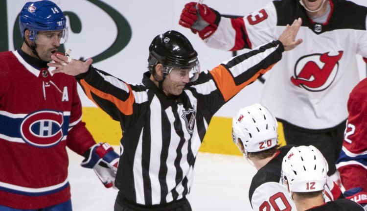 NHL referee Wes McCauley, seen here in action during a preseason game between the Canadians and Devils on Monday, is well known for his animated calls, but also for making the right call more often than not.