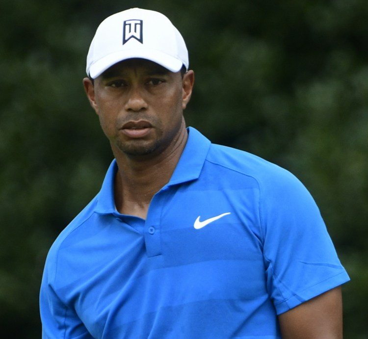 Tiger Woods is in position for his first win since 2013 after shooting a 5-under 65 in the third round of the Tour Championship.