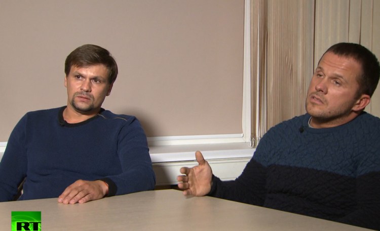 Ruslan Boshirov, left, and Alexander Petrov give an interview in Moscow.