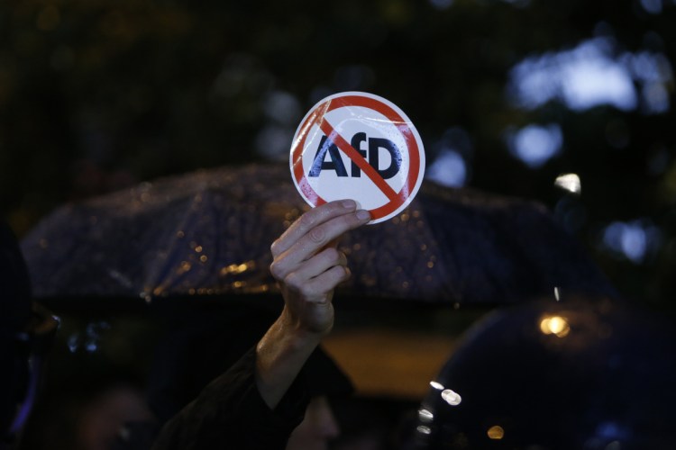 Police block demonstrators protesting against the nationalist Alternative for Germany, or AfD, party in Berlin on  Monday.