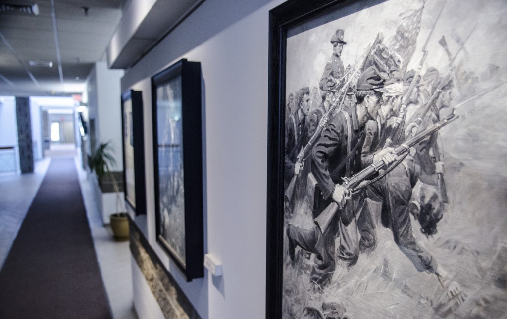 The seven paintings given to Augusta by accomplished artist and city native William Herbert "Buck" Dunton, depicting Civil War scenes, are seen Friday at Augusta City Center.