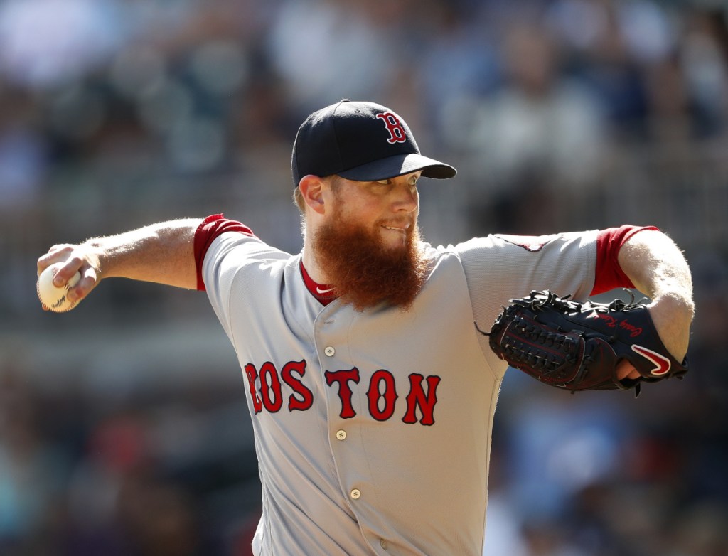 Boston Red Sox relief pitcher Craig Kimbrel works against the Atlanta Braves in the ninth inning Monday in Atlanta.