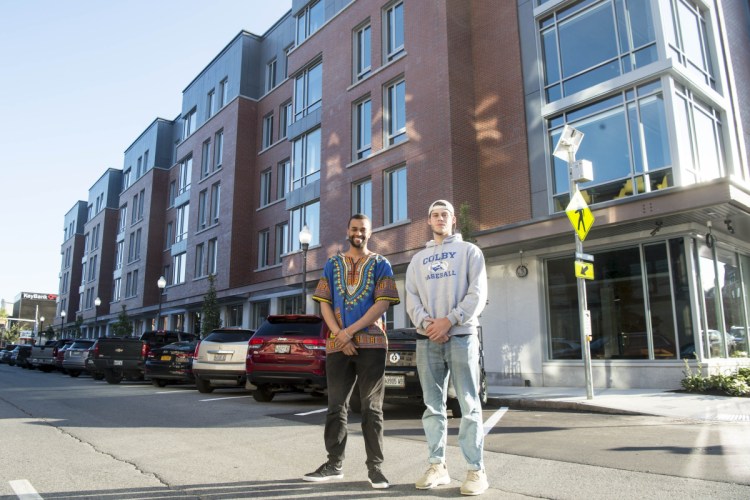 Colby College's new residential complex downtown will be open to the public for guided tours after its official opening at 10 a.m. Thursday. Colby students Moeketsi Justice Mokobocho, left, and Matt Reasor have been in residence at the Waterville downtown dormitory for a couple of weeks and were joined by other residents on Monday.