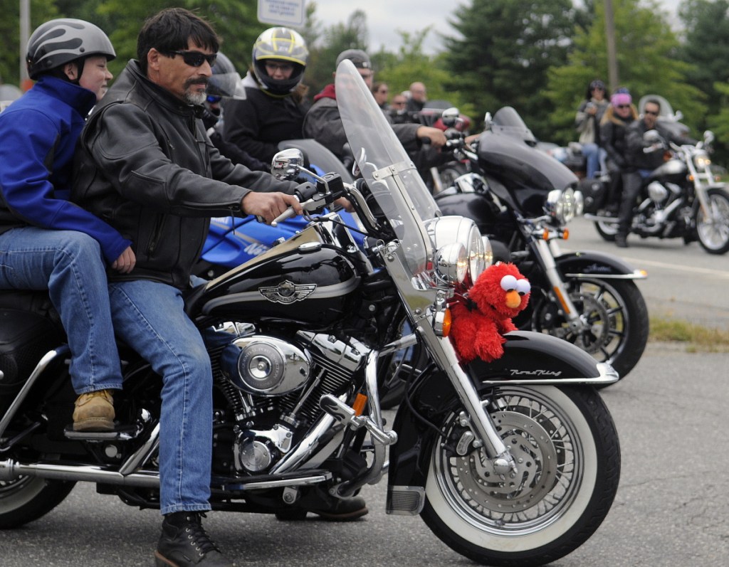 Bikers ride on Sept. 13, 2015, out of the Augusta Civic Center to the Windsor Fairgrounds during the 34th Annual Toy Run. Thousands of motorcyclists participated in the trek to donate toys for children.