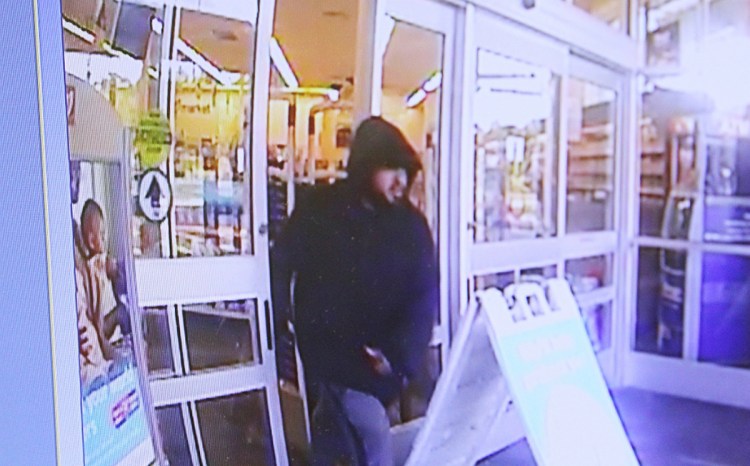 A surveillance camera image of the man suspected of robbing the Walgreens Pharmacy on Memorial Circle Sunday morning.