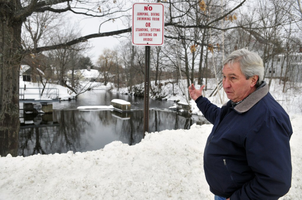 Tom Heiss talks about construction plans on Feb. 15, 2017 at his home next to the Maranacook dam in Winthrop.