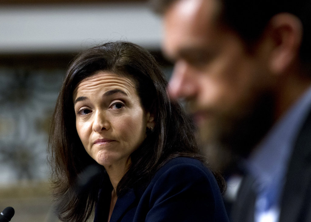 Facebook COO Sheryl Sandberg accompanied by Twitter CEO Jack Dorsey, right, before the Senate Intelligence Committee hearing on 'Foreign Influence Operations and Their Use of Social Media Platforms' on Capitol Hill, Wednesday in Washington. Google CEO did not show for the hearing. 