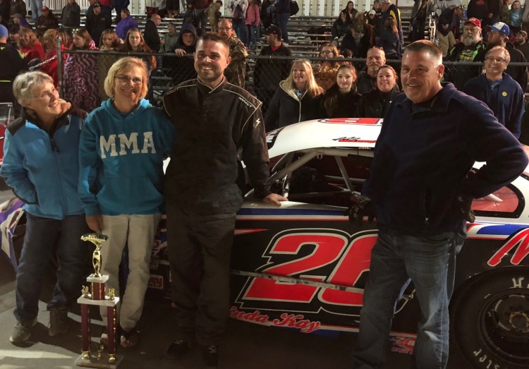Andrew McLaughlin of Harrington, third from left, celebrates his Late Model championship with family at Wiscasset Speedway in Wiscasset on Saturday night.