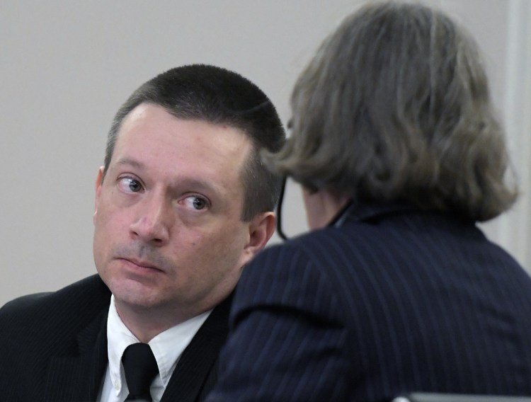 Scott Bubar speaks with his attorney, Lisa Whittier, during the closing arguments of his trial on Monday at the Capital Judicial Center in Augusta. Bubar, 41, of Brunswick, is standing trial on charges of aggravated attempted murder of Sgt. Jacob Pierce and reckless conduct with a dangerous weapon, both of which allegedly occurred May 19, 2017, at a mobile home at 1003 Oakland Road, in Belgrade.