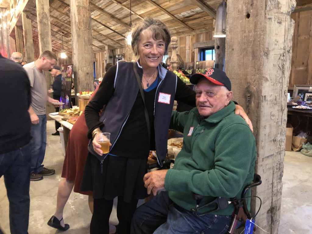 Two past presidents of the RFA Heidi Sorensen, left, and Paul Ellis, at the 50th anniversary party of the organization held on Sept. 25 at the Mountain Star Estate in Rangeley.