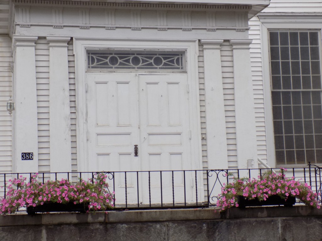The First Congregational Church on Main Street in Wilton was damaged Monday night when someone set fire to a 200th anniversary banner strung across the front, a state fire investigator said Monday.
