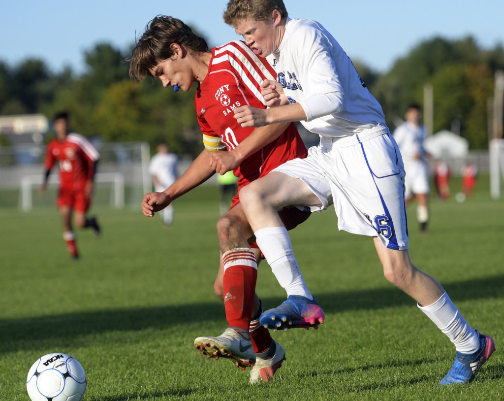 Cony's Alex Cousins, left, and Erskine's Wes McGlew go for possession of the ball during a Kennebec Valley Athletic Conference game against Cony  on Wednesday in Augusta.