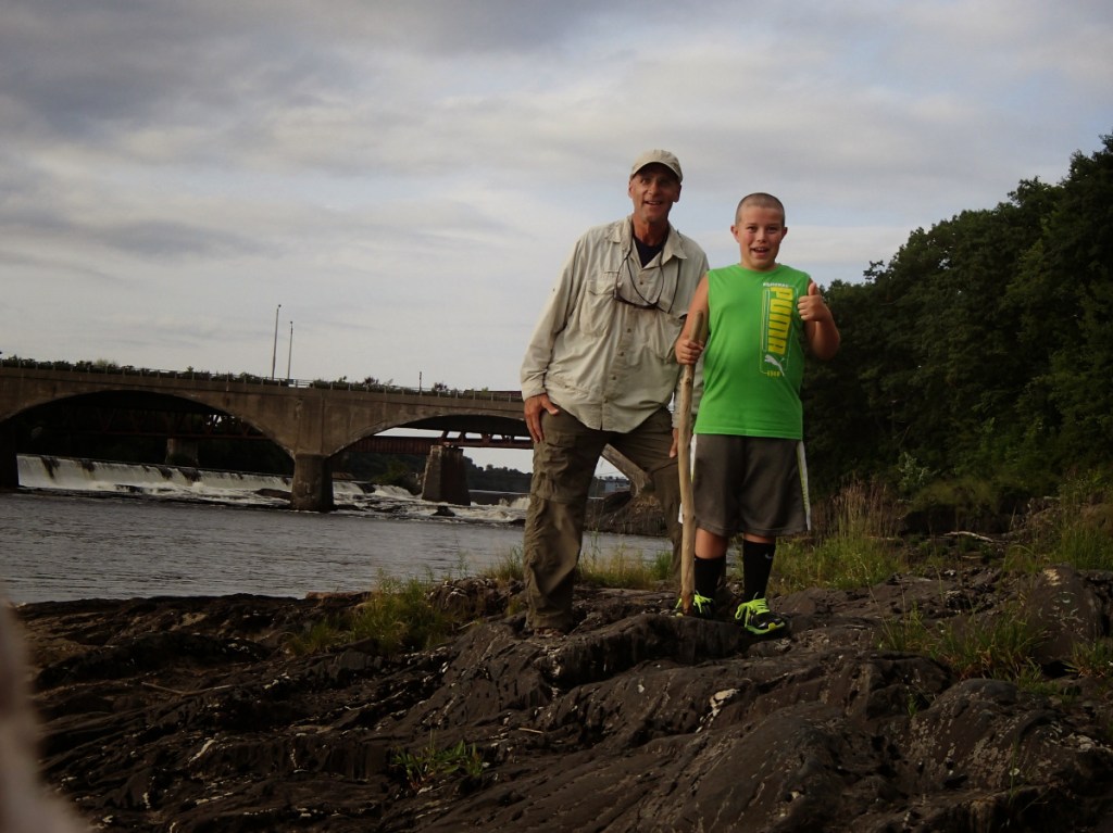 Big Brother Richard Behr, left, and Little Brother Jaxen Wiegand and his hiking on one of their weekly visits as part of their community-based match through Big Brothers Big Sisters of Mid-Maine.