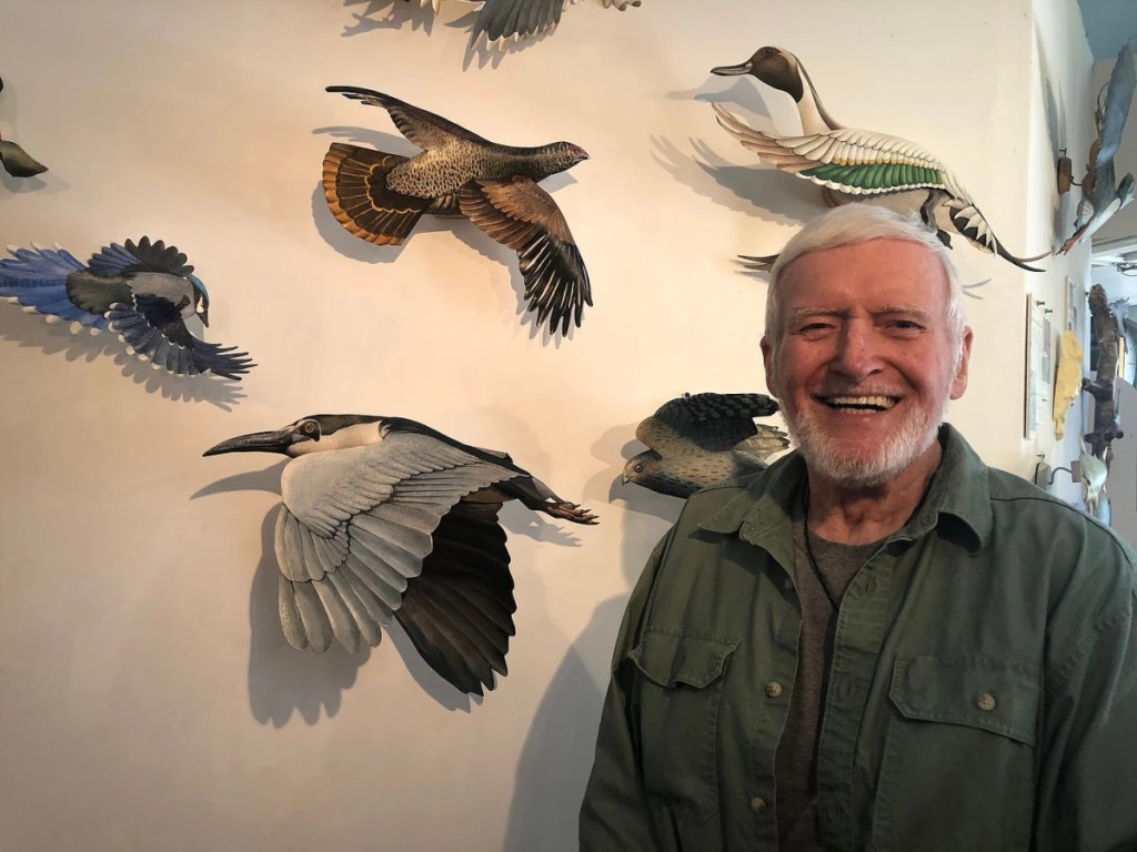 Featured artist Hugh Verrier, 87, creates birds by forming heavy French paper into elegant and life-sized wings, beaks and bodies. He then brings them to life with watercolors. The fish are carefully crafted to mimic an actual fishermen's catch. The results are life-like, light-weight and archival.