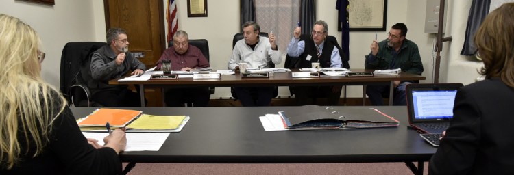 Somerset County commissioners — from left, Cyp Johnson, Lloyd Trafton, Chairman Newell Graf Jr., Robert Sezak and Dean Cray — vote during a meeting in January in Skowhegan.