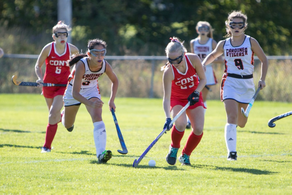 Cony sophomore Anna Reny takes control of the ball while Gardiner senior Sarah Foust closes in to defend during a game Saturday in Gardiner.