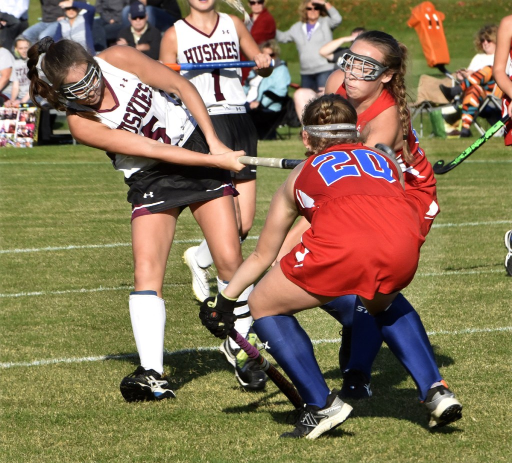 MCI's Madisyn Hartley shoots as Messalonskee's Jenna Cassani (20) pressures during a game Wednesday in Pittsfield.