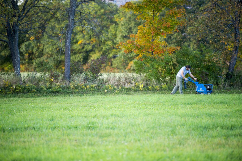 Mike Spurrier cuts a path Oct. 3 as a volunteer trail builder for the Kingfield Trail Builders in Kingfield.