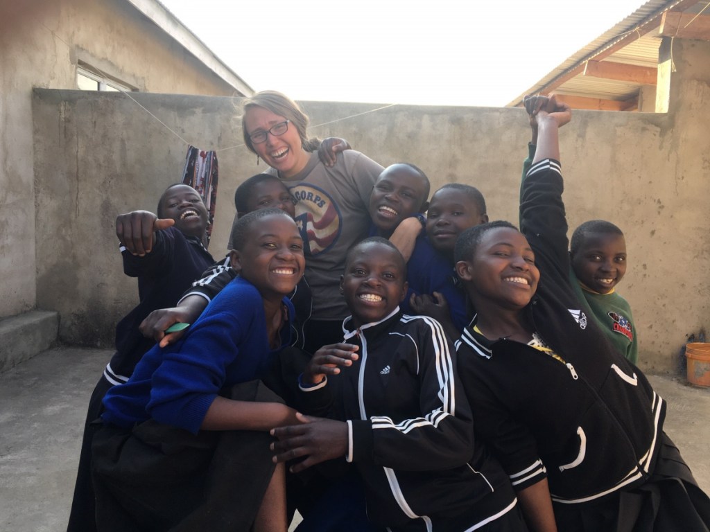 Elizabeth Ferry, of Winslow, is seen working with the Peace Corps in Tanzania.