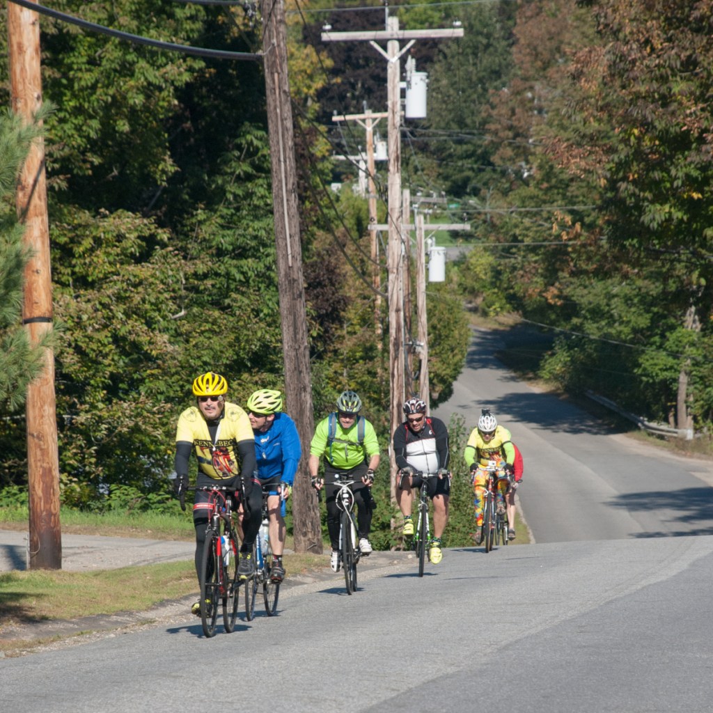 Joseph Lacroix, of Windsor, leads the way up Main Street in Coopers Mills near the Sheepscot Valley Health Center. Share The Road With Carol is a memorial bike ride in Windsor and Whitefield held to honor the memory of Jeffrey Frankel's late wife, Carol Eckert, M.D., and to promote the cause of bicycle safety.