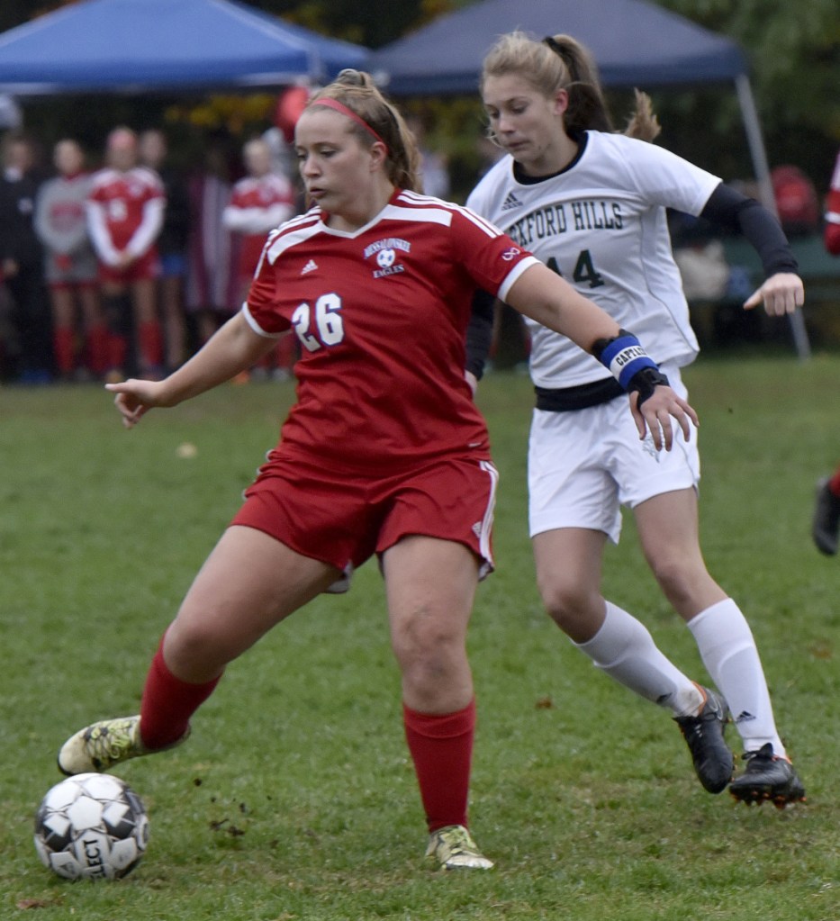 Messalonskee's Grace Bourgoin (26) and Oxford Hill's Ella Kellogg compete during a game Monday in Oakland.