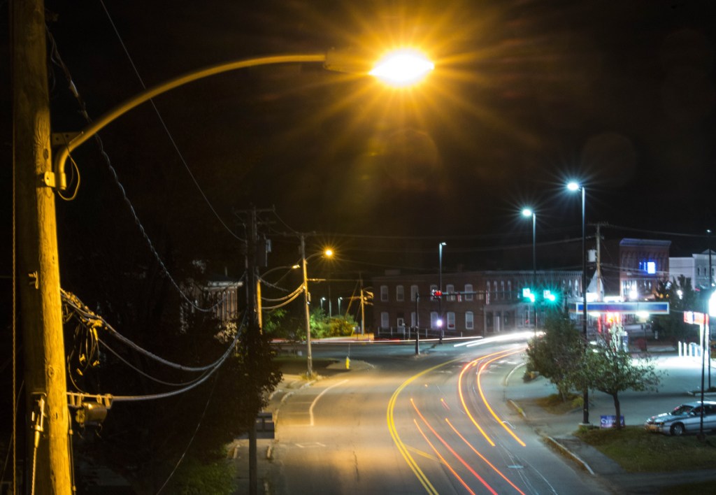 A lone street light illuminates Upper Main Street next to the train overpass in Fairfield on Friday night.