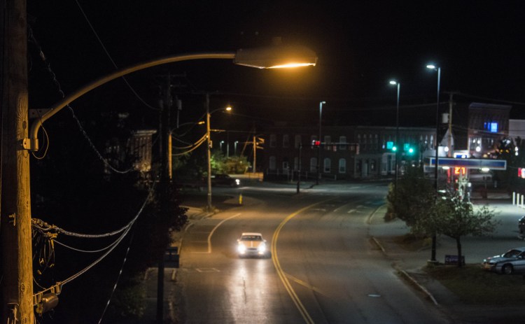 A lone street light illuminates Upper Main Street next to the train overpass in Fairfield on Friday night.