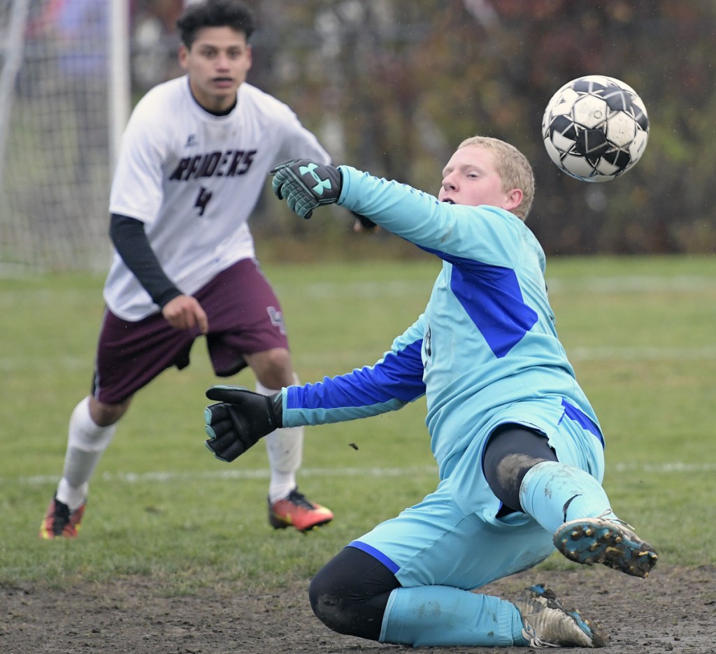 Gardiner keeper Timmy Doyle can't stop this Washington Academy shot during a Class B North quarterfinal game Tuesday in Gardiner.