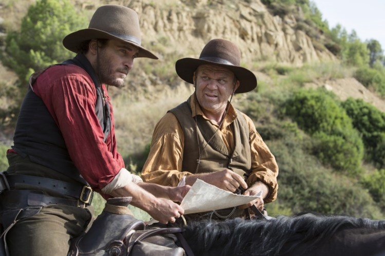 Joaquin Phoenix, left, stars as Charlie Sisters and John C. Reilly, right stars as Eli Sisters in Jacques Audiard's "The Sisters Brothers,"an Annapurna Pictures release.