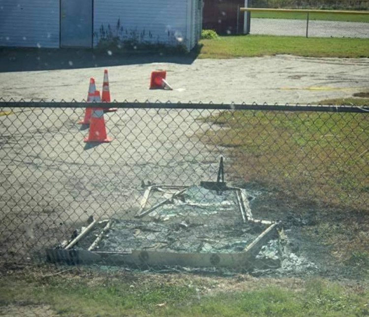 Two teenage boys have been charged after a police investigation linked them to a fire that destroyed a portable outhouse Sunday at Houdlette Field in Richmond.