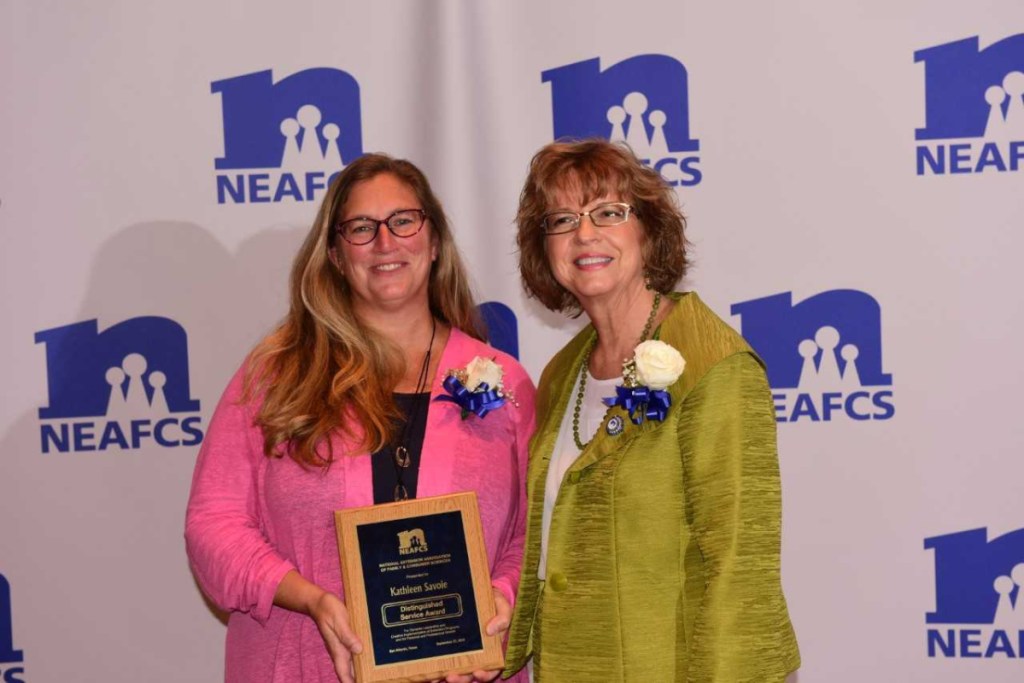 University of Maine Cooperative Extension educator Kathy Savoie, left, recently was presented with the Distinguished Service Award by Lora Lee Frazier Howard, National Extension Association of Family and Consumer Sciences board president.