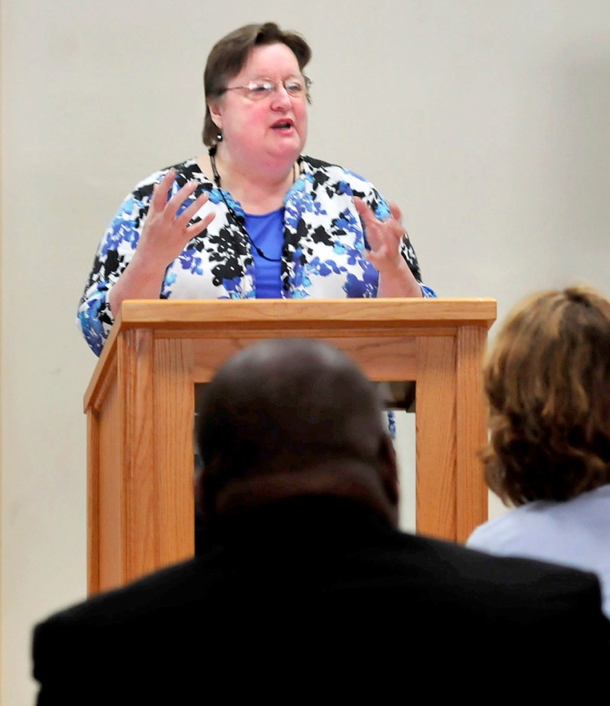 Betty Palmer, executive director of the Mid-Maine Homeless Shelter in Waterville, speaks about the issue of youth homelessness that the organization has seen firsthand during a forum on the subject on April 30, 2014.