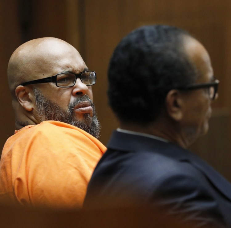 Marion "Suge" Knight, left, pleads no contest to voluntary manslaughter and agrees to a prison sentence of 28 years.