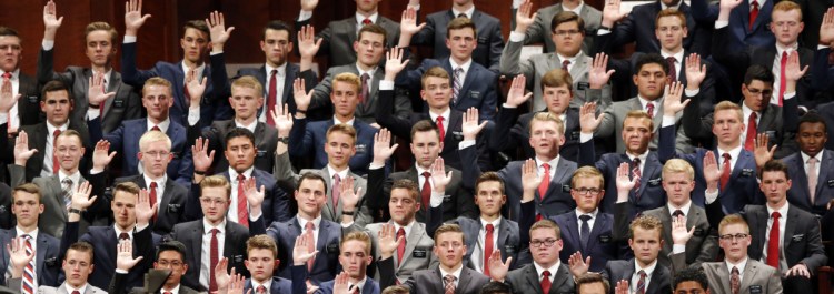 Mormons participate in a custom called a "sustaining" when Latter-day Saints stand and raise their hands during the conference of The Church of Jesus Christ of Latter-day Saints.