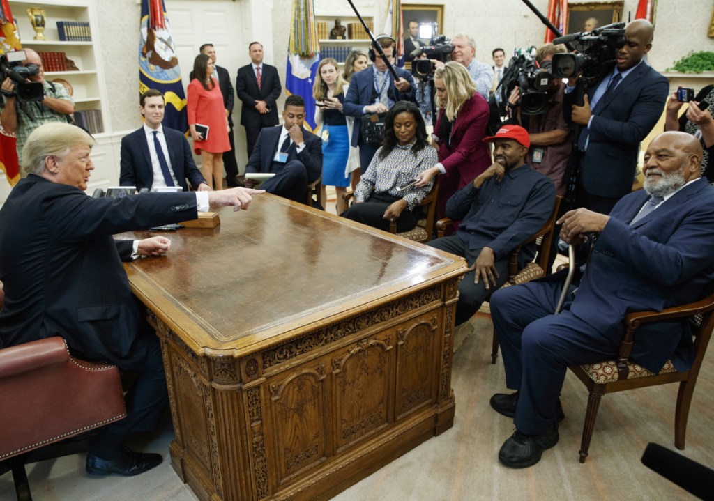President Trump meets Thursday with rapper Kanye West and Jim Brown, an ex-NFL player, in the Oval Office. The low unemployment rate among African-Americans was one of the issues they discussed.