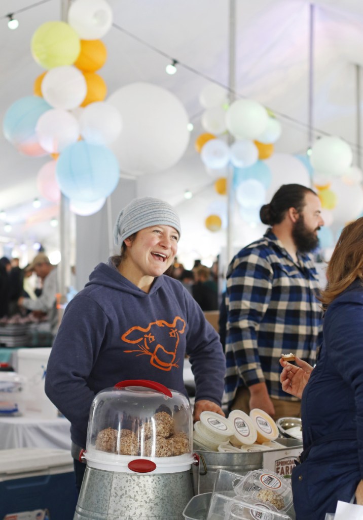 Carrie Whitcomb of Springdale Farm in Waldo sells cream cheese at Market on the Harbor, the grand finale of the annual Harvest on the Harbor.