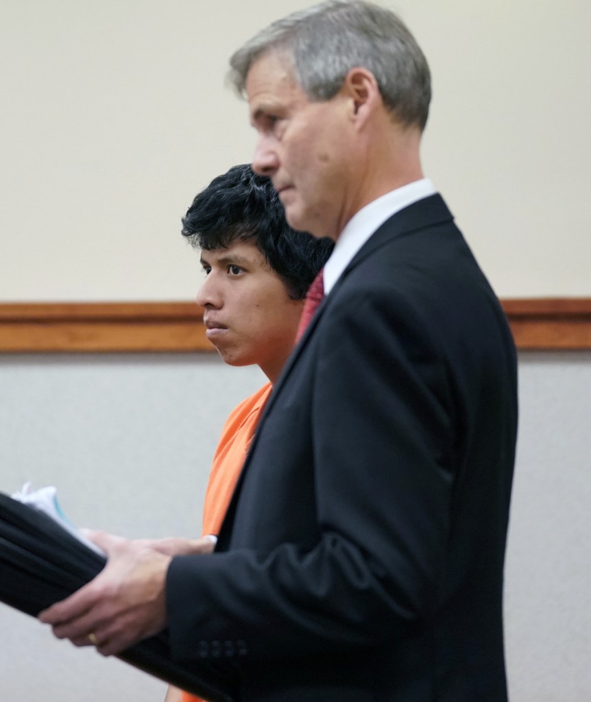 Nicolas Blanchard stands next to his attorney, Ed Folsom, at his initial appearance Monday at the Cumberland County Courthouse. Blanchard is charged with stabbing a 15-year-old during a soccer game in Scarborough on Friday.
