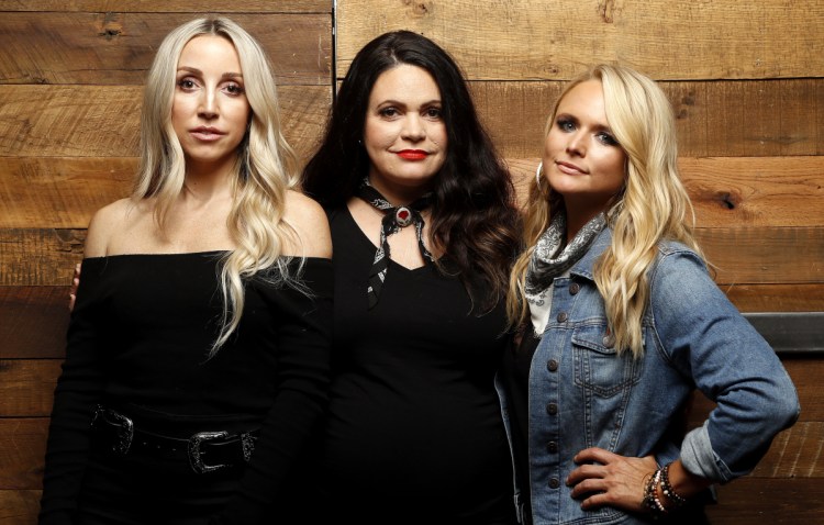 Of the Pistol Annies' feel-good divorce song, Ashley Monroe, from left, Angaleena Presley and Miranda Lambert say, "You're welcome."