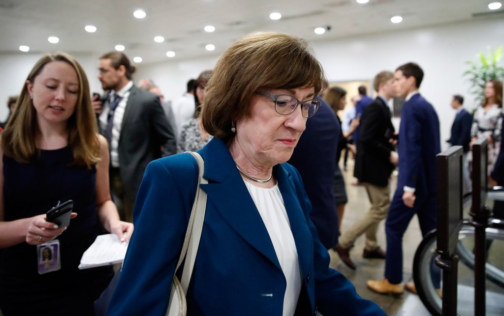Sen. Susan Collins, R-Maine, walks on Capitol Hill on Wednesday in Washington. The corridors outside her office were cleared by Capitol Police and media were being kept away, apparently because of security concerns, according to a CNN reporter.